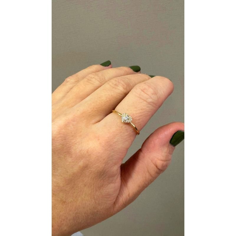 ANEL COM CORAÇÃO CRAVEJADO EM OURO 18K