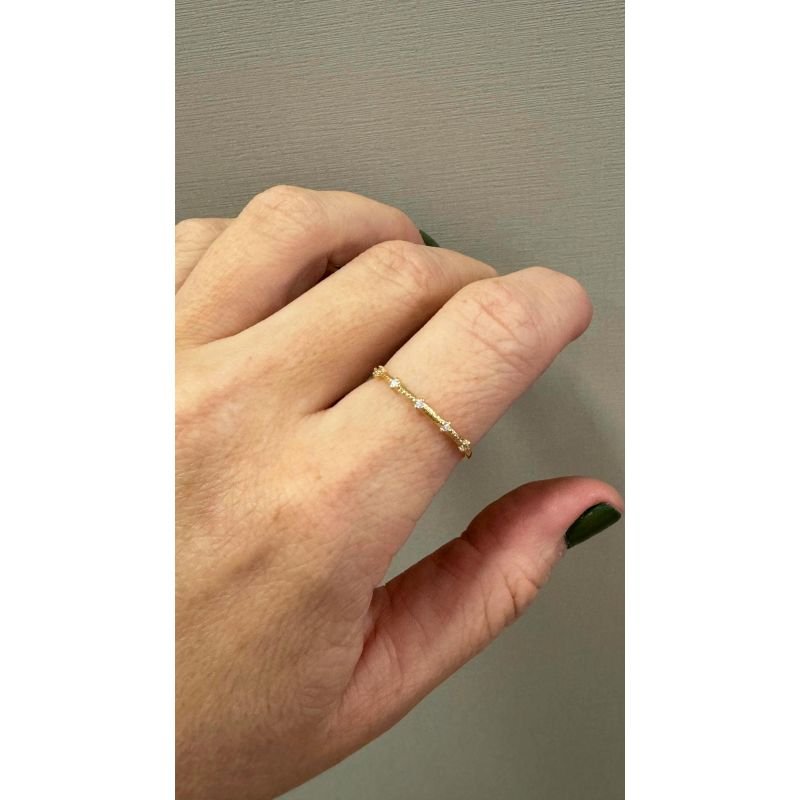 ANEL COM DETALHES TRANÇADOS EM OURO 18K
