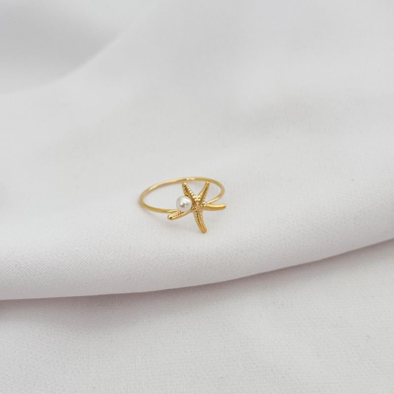 ANEL ESTRELA DO MAR COM PEROLA EM OURO 18K