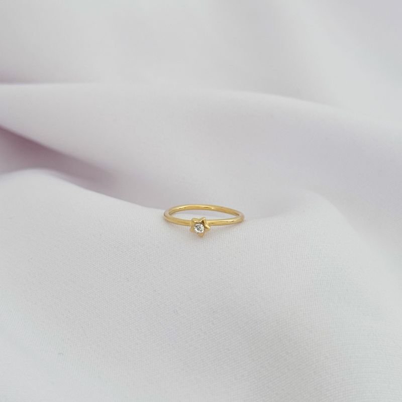 ANEL INFANTIL ESTRELA E PONTO DE LUZ EM OURO 18K