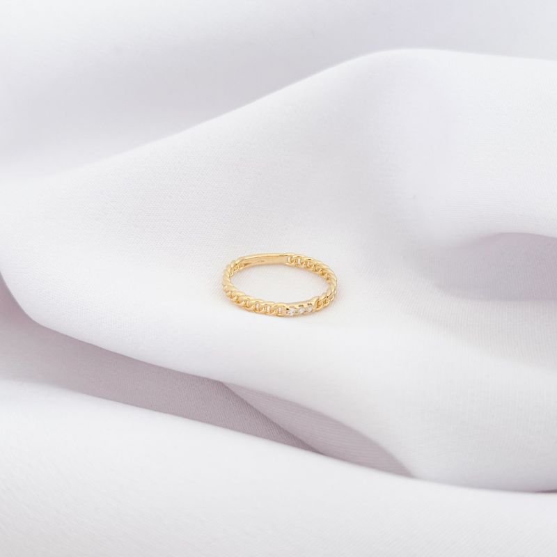 ANEL TRANÇADO COM ZIRCONIAS EM OURO 18K