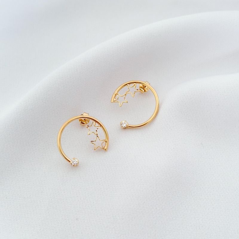 ARGOLA C/ ESTRELAS VAZ. DIAMANTADAS C/ PONTOS DE LUZ EM OURO 18K
