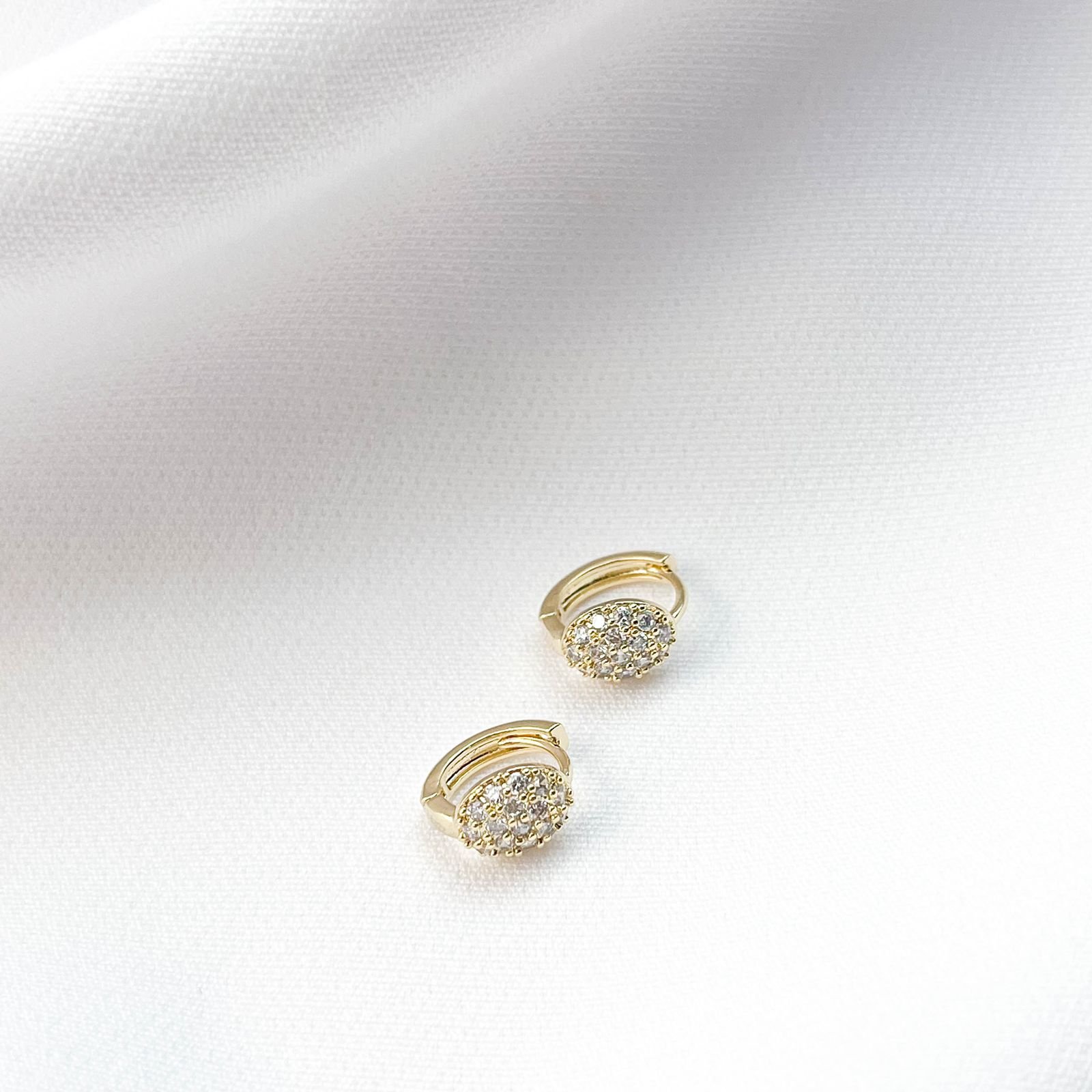 BRINCO ARTICULADO COM BOLA EM ZIRCONIAS EM OURO 18K