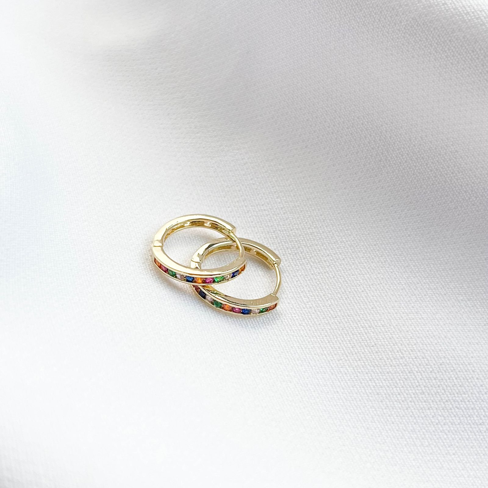 BRINCO ARTICULADO ZIRCÔNIAS COLORIDAS EM OURO 18K
