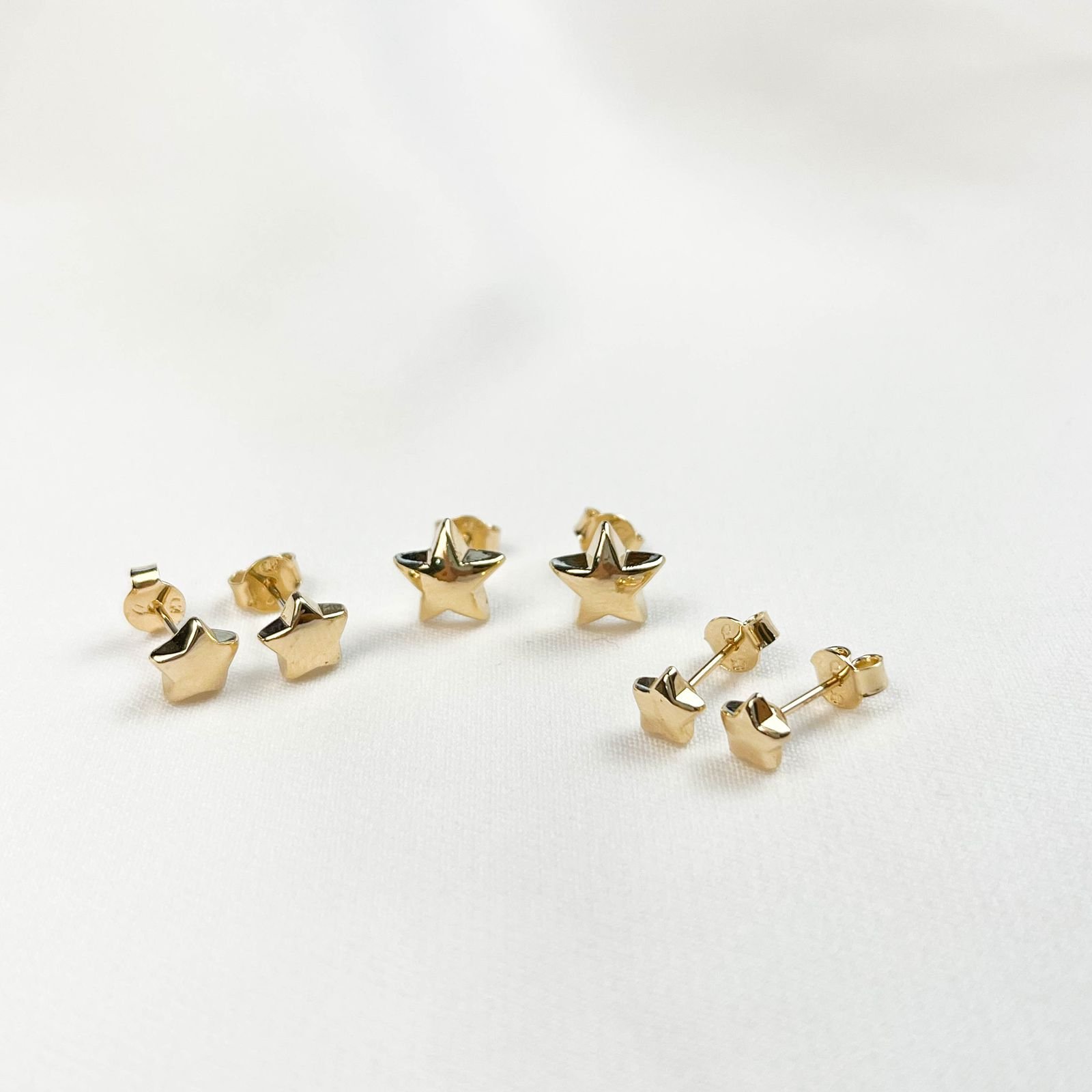 TRIO ESTRELAS LISAS EM OURO 18K