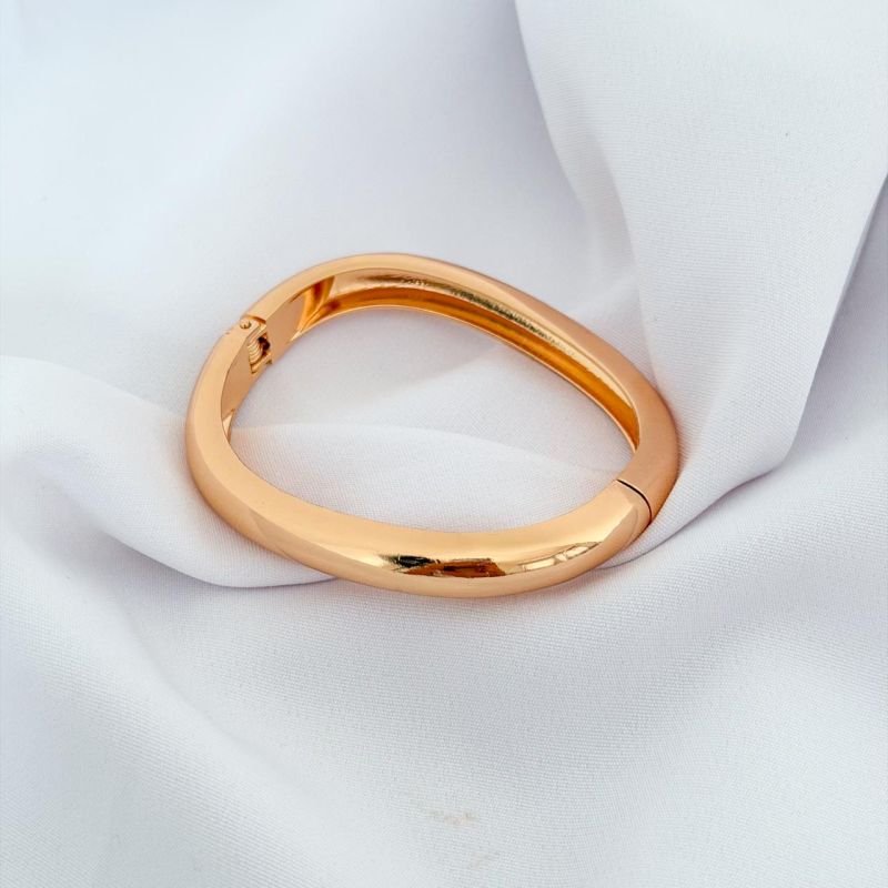 BRACELETE OVAL ONDULADO GROSSO EM OURO 18K