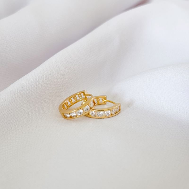 BRINCO ARTICULADO 5 PEDRAS EM OURO 18K