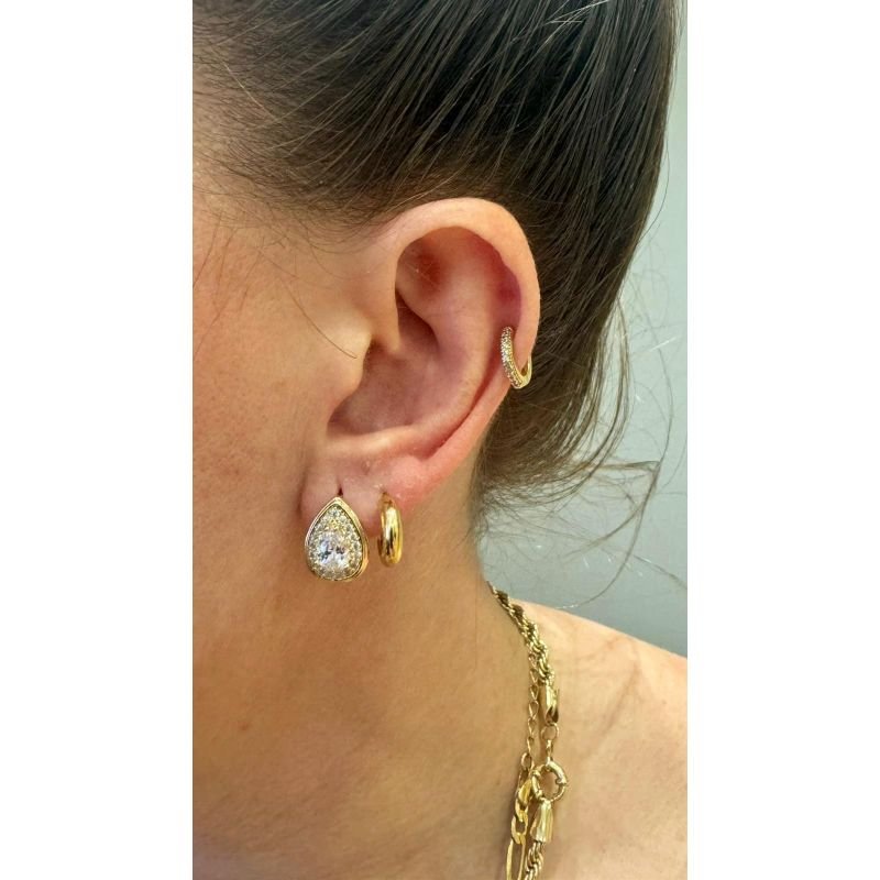 BRINCO ARTICULADO COM PEDRA GOTA NA FRENTE EM OURO 18K