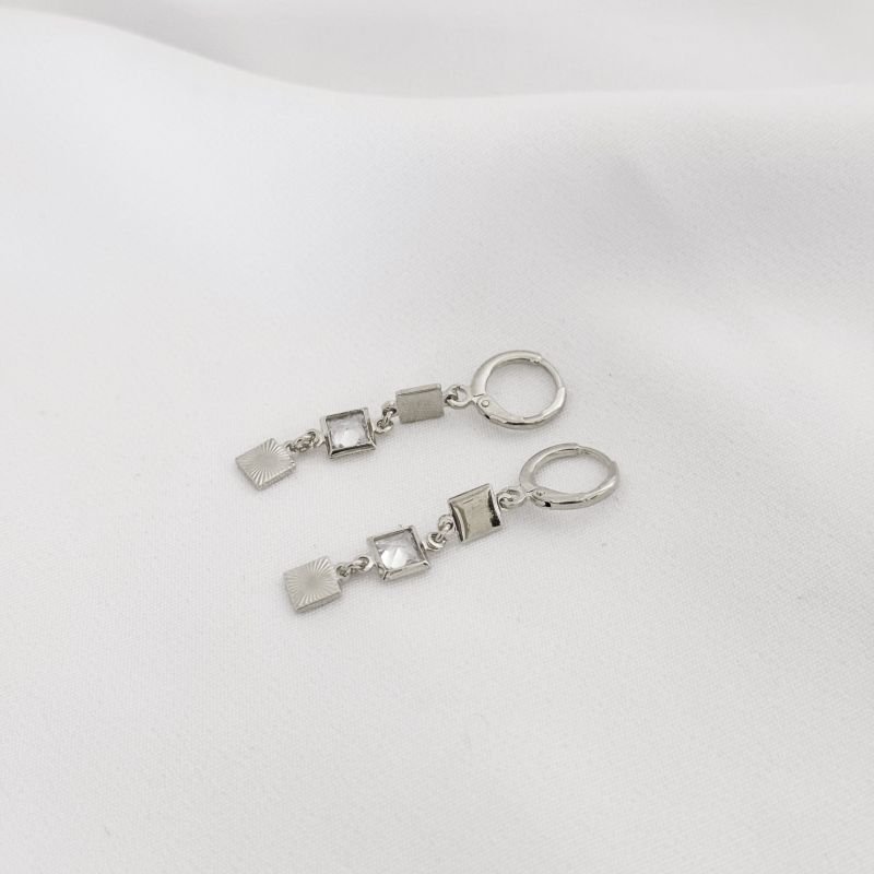 BRINCO ARTICULADO COM ZIRCONIA CARRE E QUADRADO DIAMANTADO EM RÓDIO BRANCO