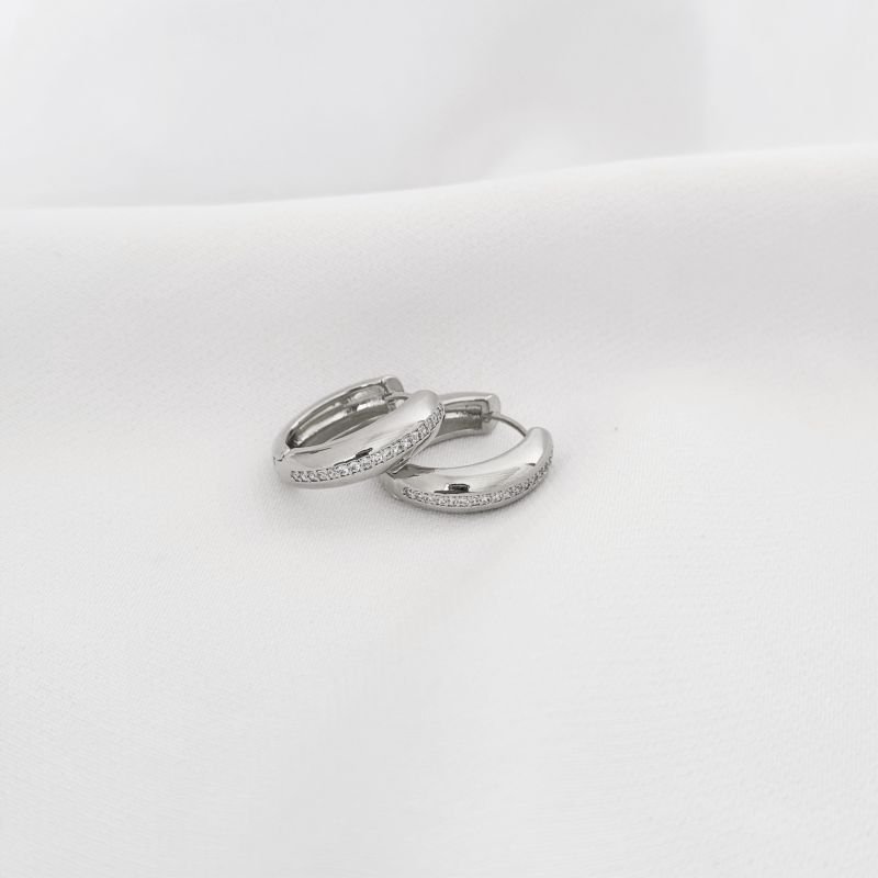 BRINCO ARTICULADO CRAVEJADO COM 1 FILEIRA DE ZIRCONIA EM RÓDIO BRANCO