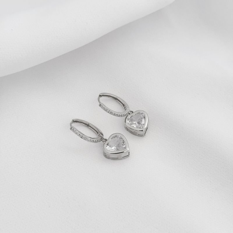 BRINCO ARTICULADO CRAVEJADO COM CORAÇÃO ZIRCONIA EM RÓDIO BRANCO