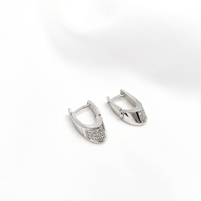 BRINCO ARTICULADO CRAVEJADO EM RÓDIO BRANCO