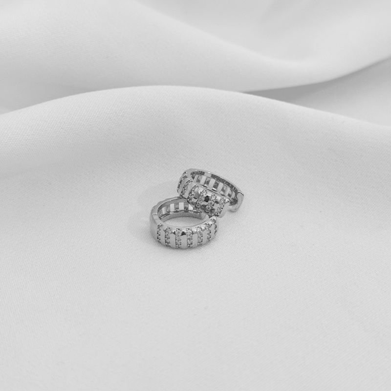 BRINCO ARTICULADO FACE ONDULADA COM ZIRCONIA EM RÓDIO BRANCO