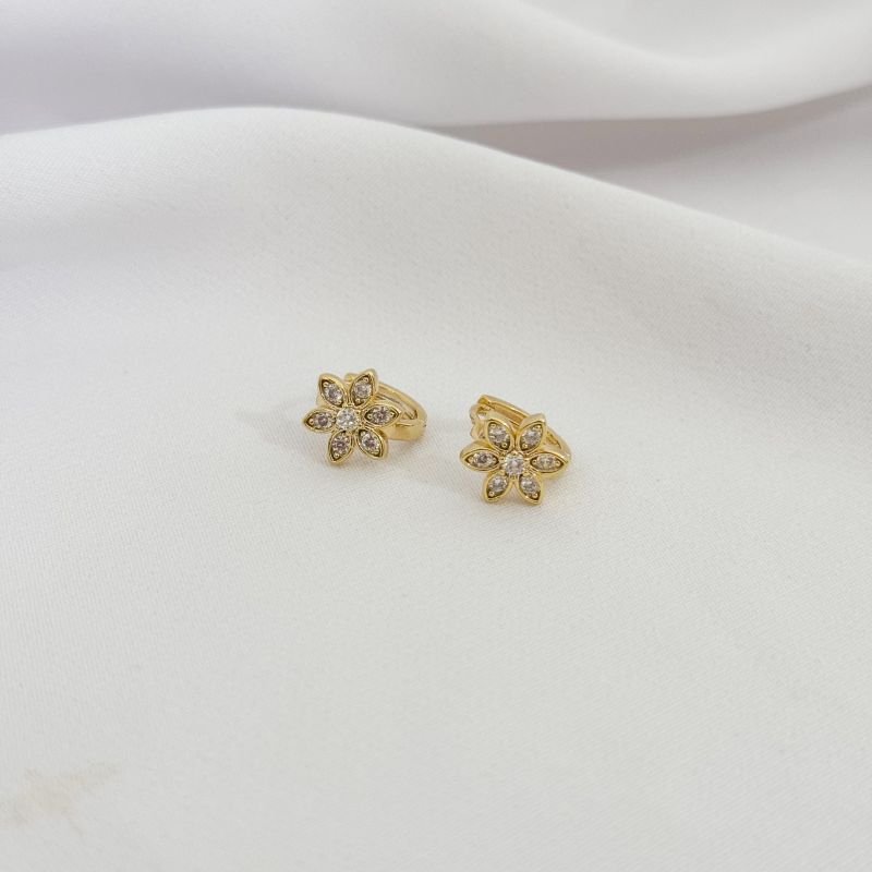 BRINCO ARTICULADO FLOR CRAVEJADA EM OURO 18K