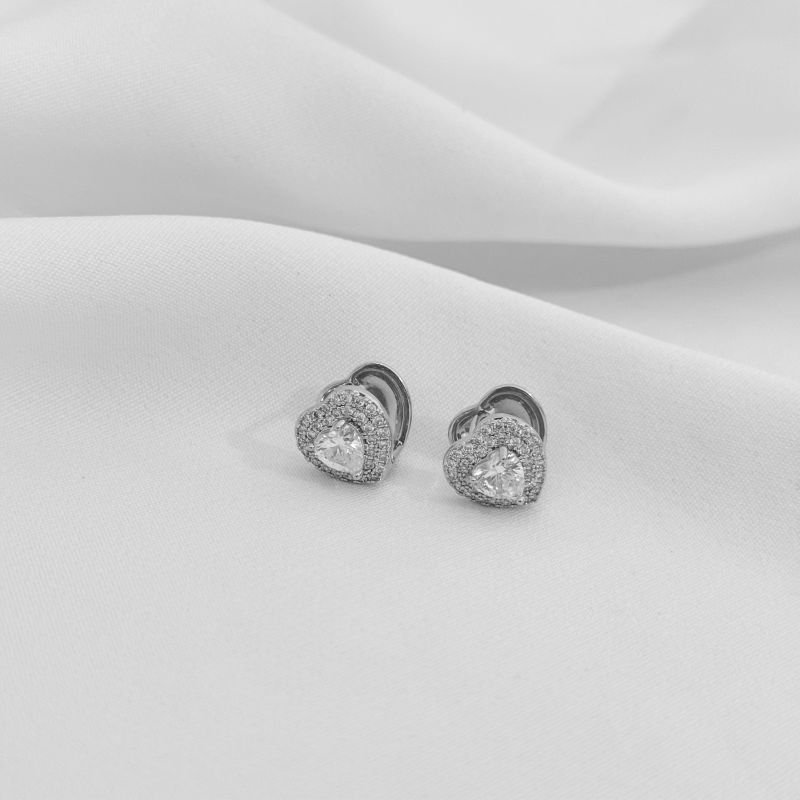 BRINCO ARTICULADO PEDRA CORAÇÃO E BORDA CRAVEJADA EM RÓDIO BRANCO