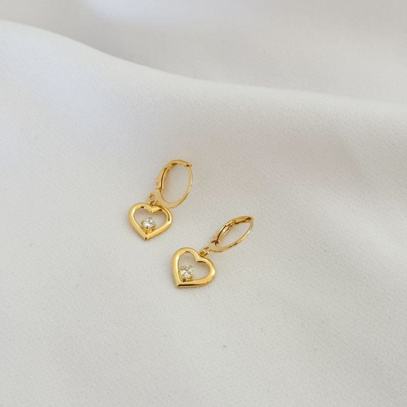 BRINCO ARTIICULADO COM CORAÇÃO VAZADO EM OURO 18K