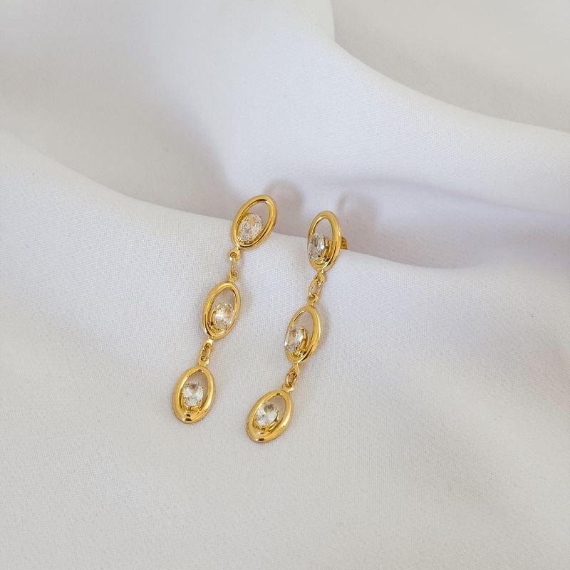 BRINCO COM OVAIS VAZADOS E ZIRCONIA OVAL EM OURO 18K
