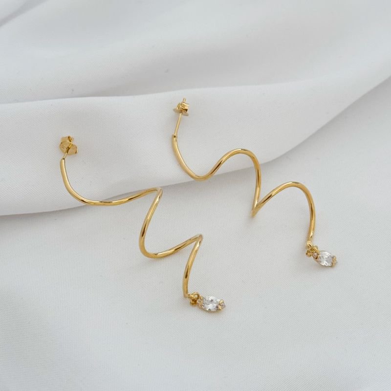 BRINCO FIO ESPIRAL COM ZIRCONIA NAVETE EM OURO 18K