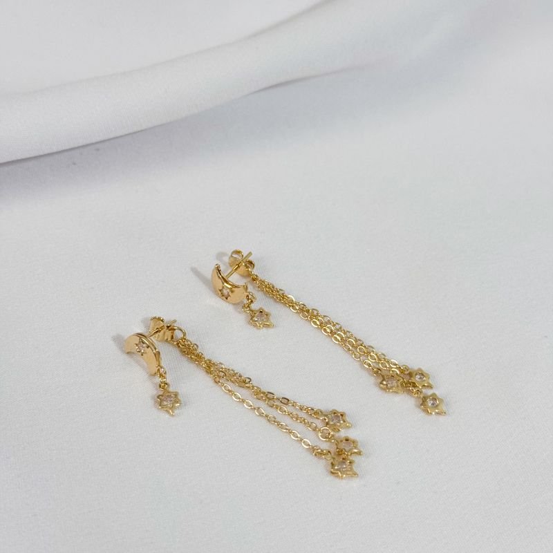 BRINCO LUA COM ESTRELAS EM ZIRCONIA EM OURO 18K