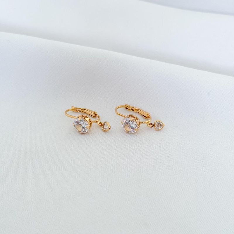 BRINCO TRANQUETA C/ ZIRCONIA REDONDA E CORACAO EM OURO 18K