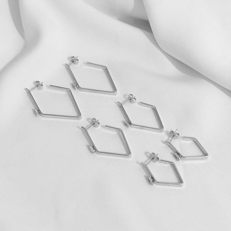 BRINCO TRIO LOSANDO COM ZIRCONIA NAVETE EM RÓDIO BRANCO