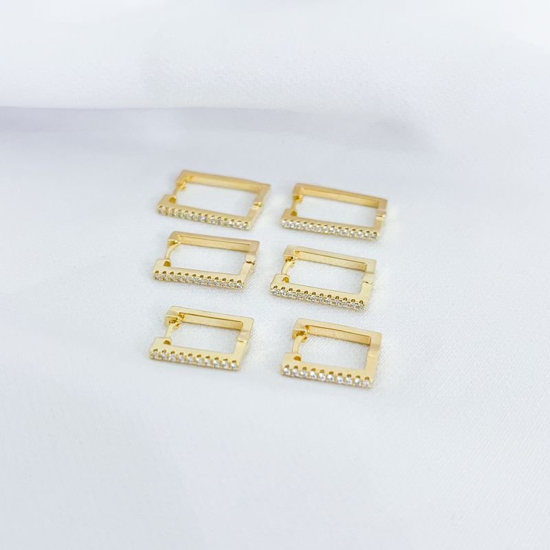 BRINCO TRIO RETANGULAR EM ZIRCÔNIAS EM OURO 18K