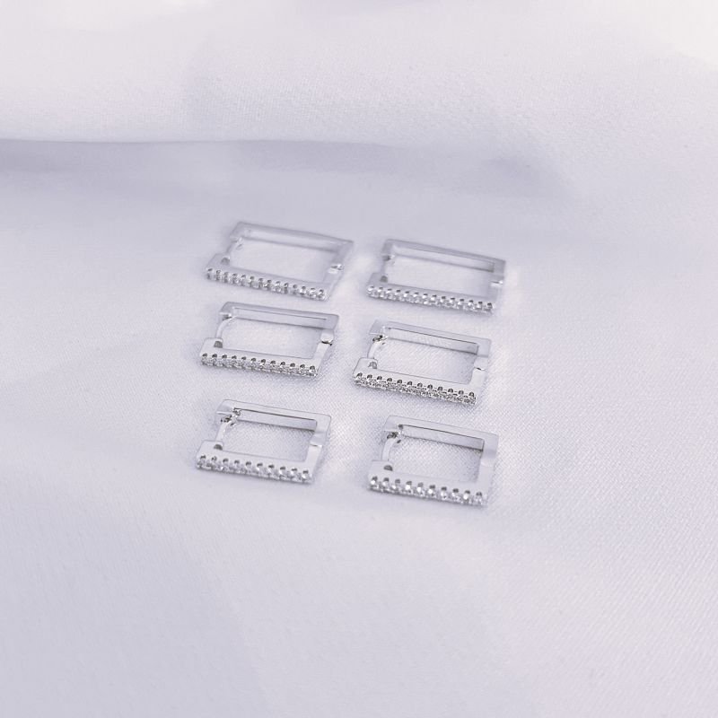 BRINCO TRIO RETANGULAR EM ZIRCÔNIAS EM RÓDIO BRANCO