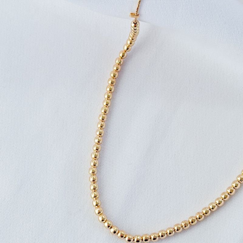 COLAR BOLINHAS DE METAL 45CM + 5CM EXTNSOR EM OURO 18K