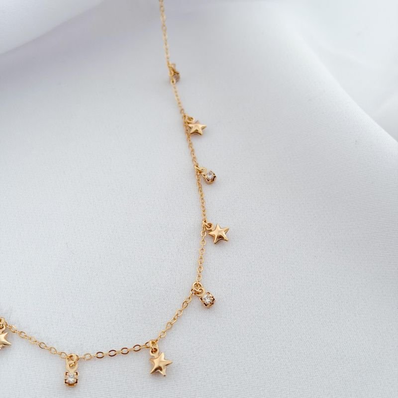 COLAR C/ ESTRELINHAS BOJUDINHAS C/ PONTOS DE LUZ EM OURO 18K