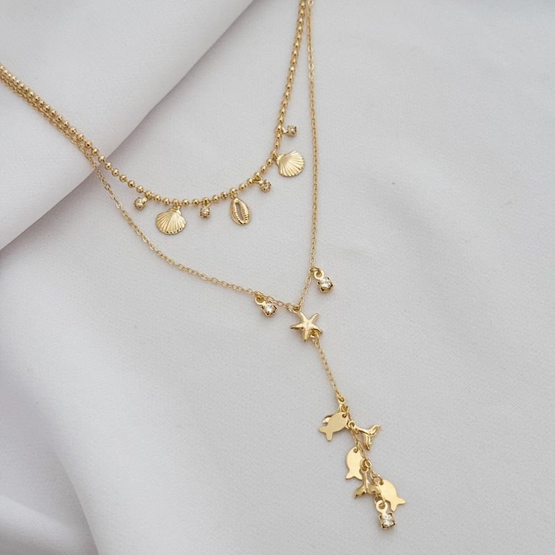 COLAR DUPLO COM ELEMENTOS MAR EM OURO 18K