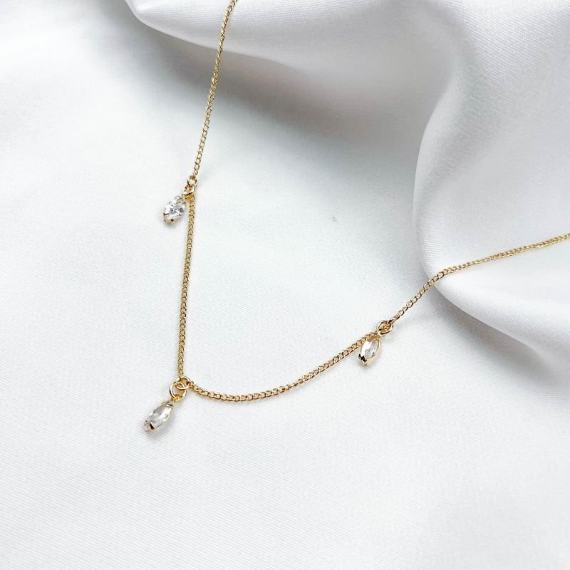 COLAR COM ZIRCONIAS E NAVETES 45 CM EM OURO 18K