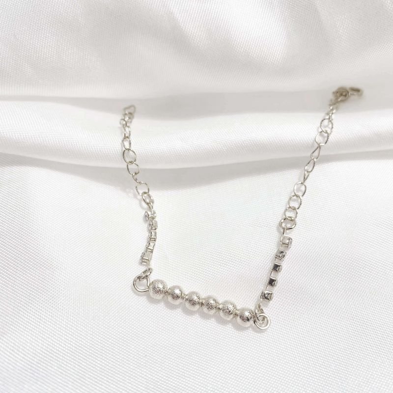 PULSEIRA BOLINHAS E ZIRCONIAS 18CM + EXTENSOR EM RÓDIO BRANCO