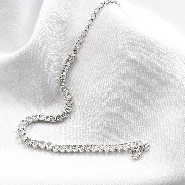 PULSEIRA RIVIERA ZIRCONIAS EM GOTA EM RÓDIO BRANCO