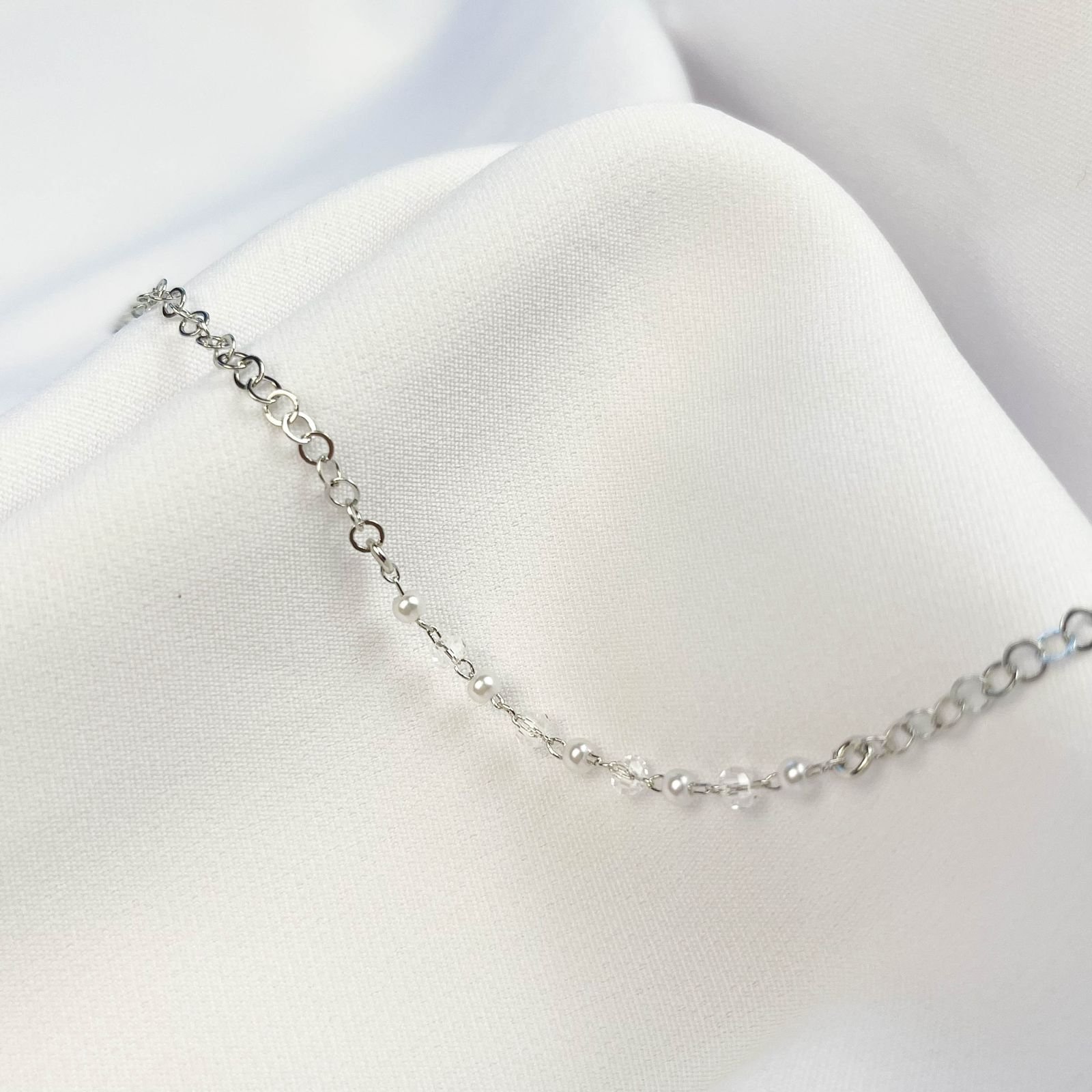 PULSEIRA METADE CORRENTE METADE PEROLAS EM RÓDIO BRANCO
