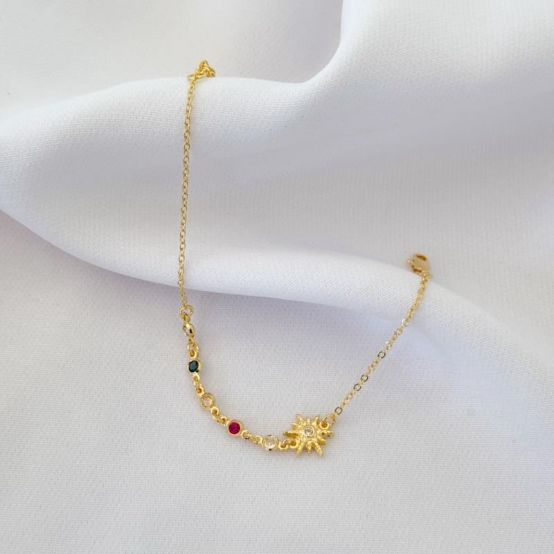 PULSEIRA COM ESTRELA E PEDRAS COLOR EM OURO 18K