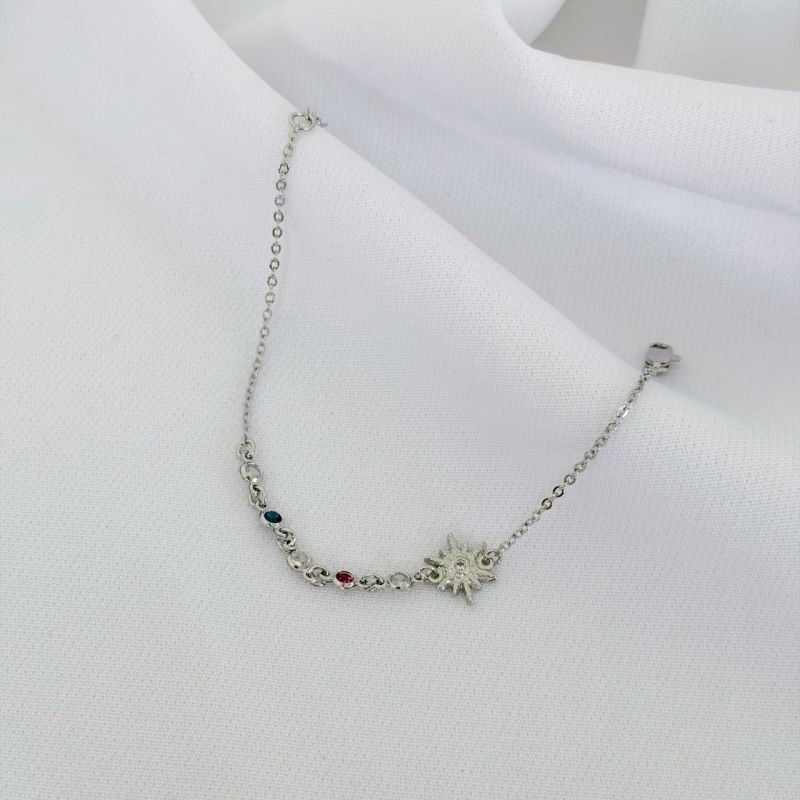 PULSEIRA COM ESTRELA E PEDRAS COLOR EM RÓDIO BRANCO