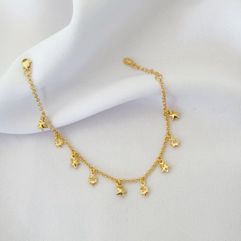 PULSEIRA COM ESTRELAS LISAS EM OURO 18K