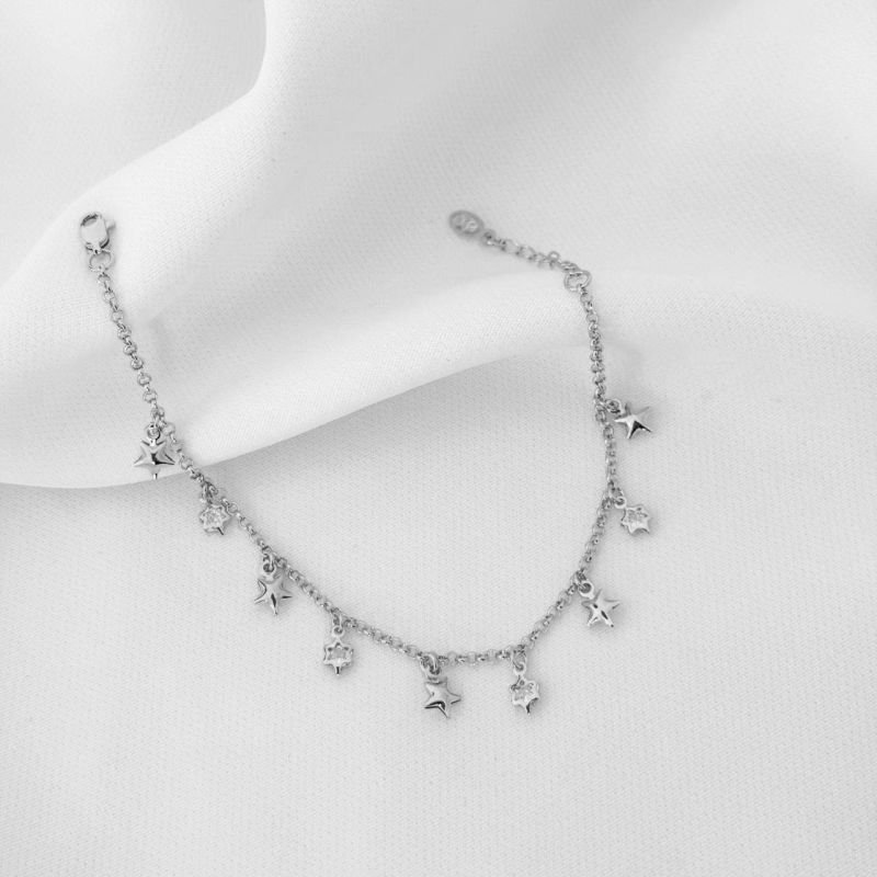 PULSEIRA COM ESTRELAS LISAS EM RÓDIO BRANCO