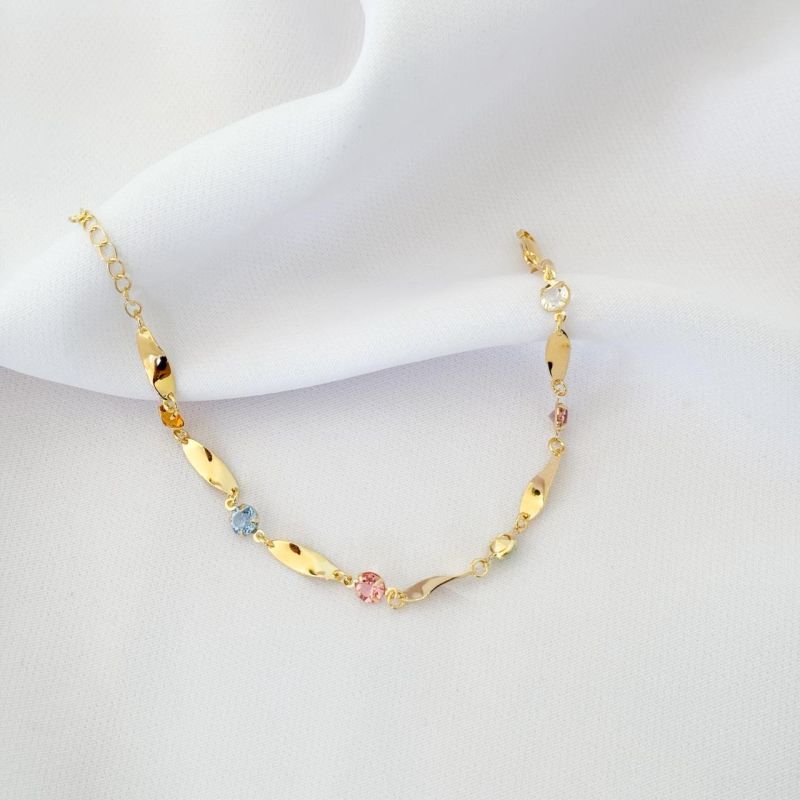 PULSEIRA COM OVAIS TORCIDA E PEDRAS COLOR 18CM + 3CM EM OURO 18K