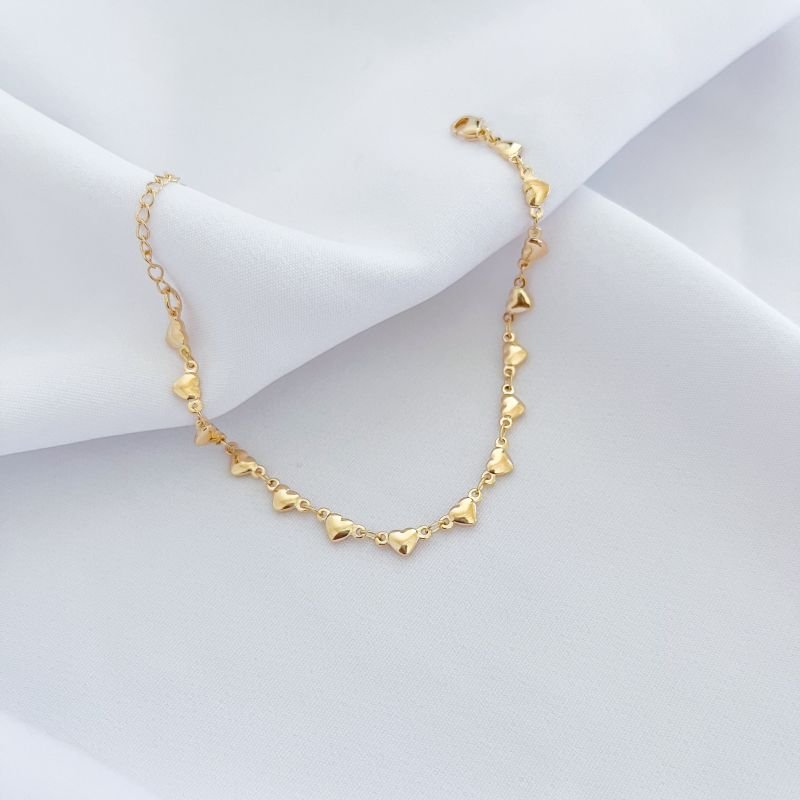 PULSEIRA CORAÇÕES EM OURO 18K
