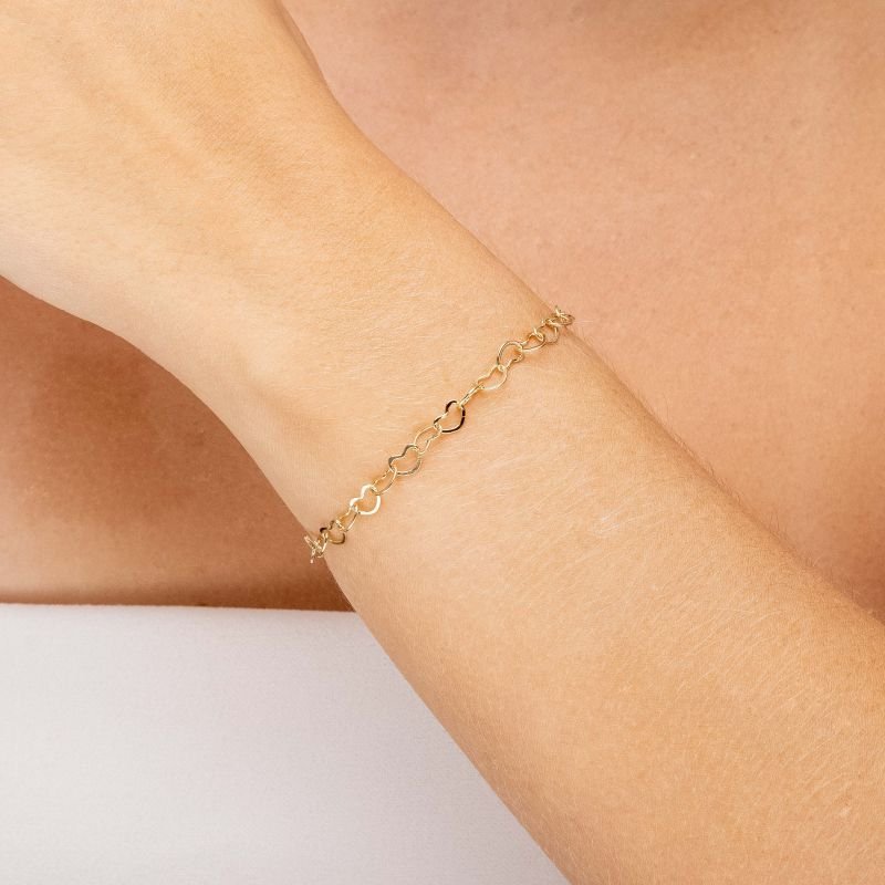 PULSEIRA CORRENTE CORAÇÃO VAZADO EM OURO 18K