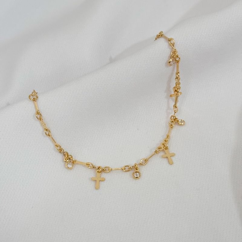 PULSEIRA CRUZ E ZIRCONIA EM OURO 18K