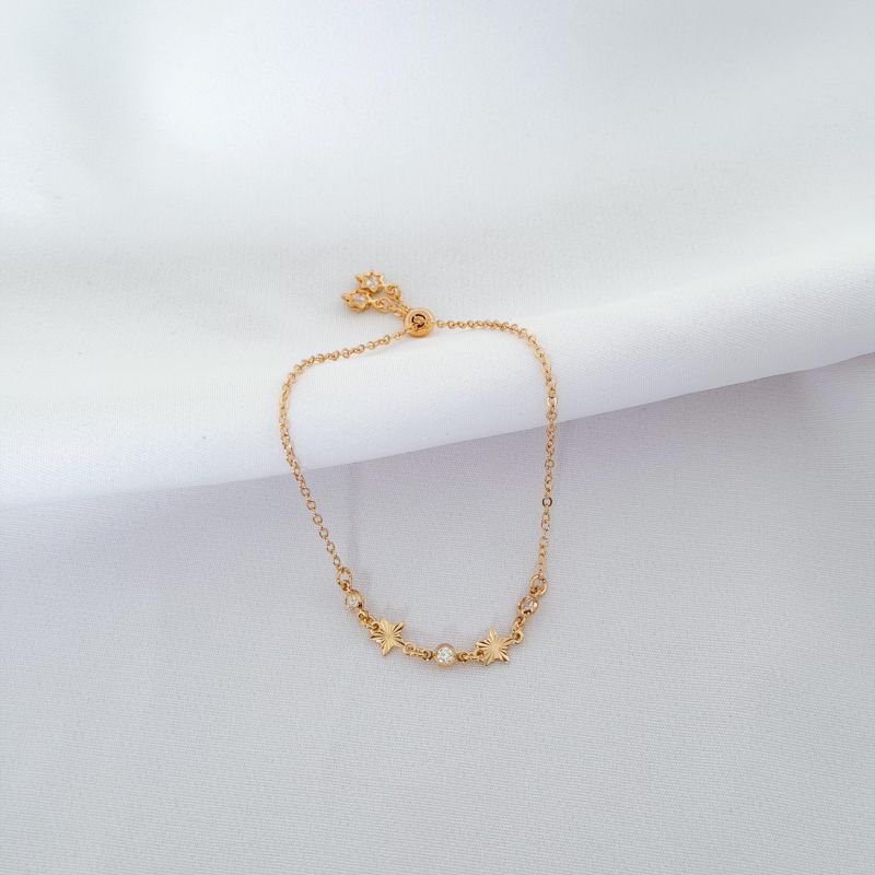 PULSEIRA FECHO DE SILICONE C/ ESTRELAS DIAMANTADAS E ZIR. EM OURO 18K
