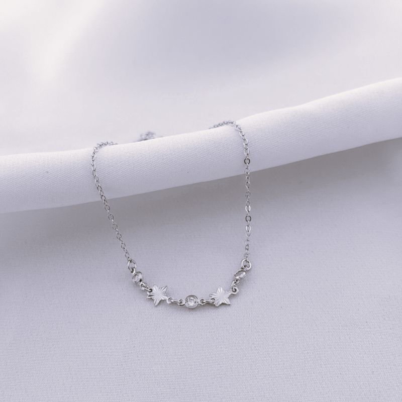 PULSEIRA FECHO DE SILICONE C/ ESTRELAS DIAMANTADAS E ZIR. EM RÓDIO BRANCO