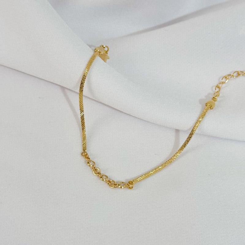 PULSEIRA FITA COM ZIRCONIAS EM OURO 18K