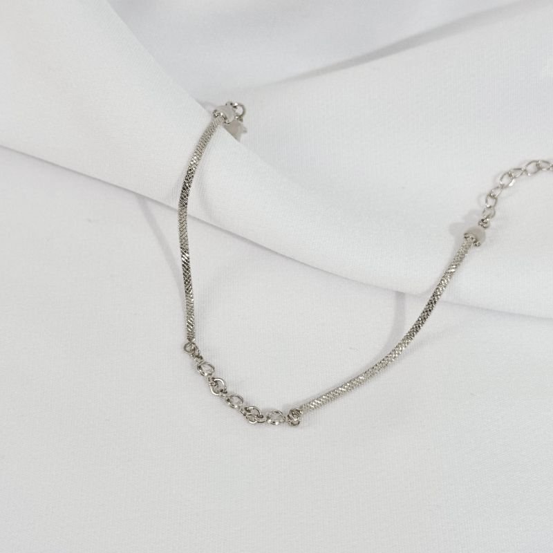 PULSEIRA FITA COM ZIRCONIAS EM RÓDIO BRANCO