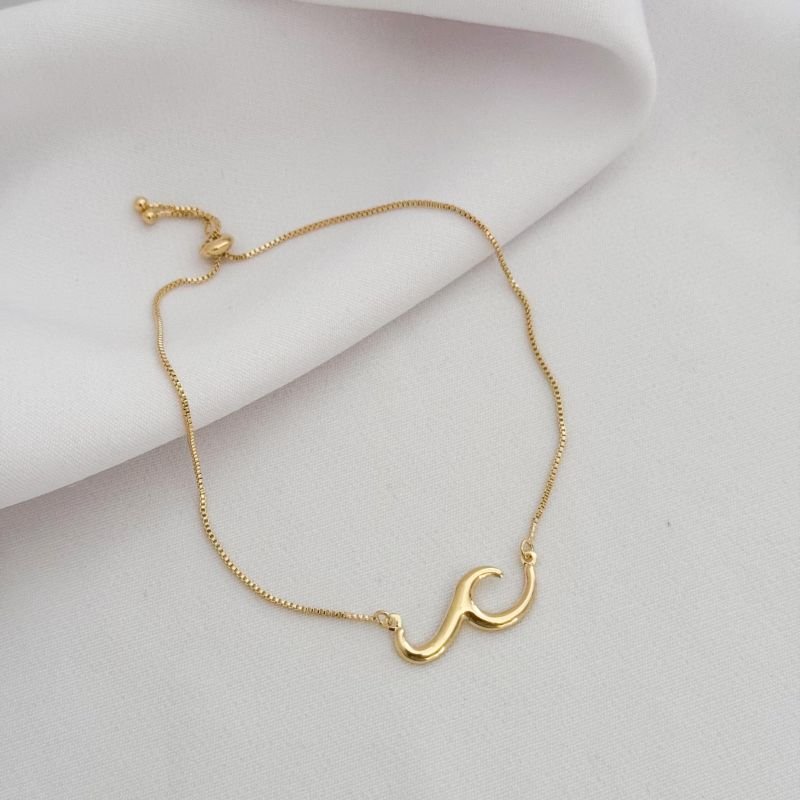 PULSEIRA ONDA COM FECHO SILICONE EM OURO 18K