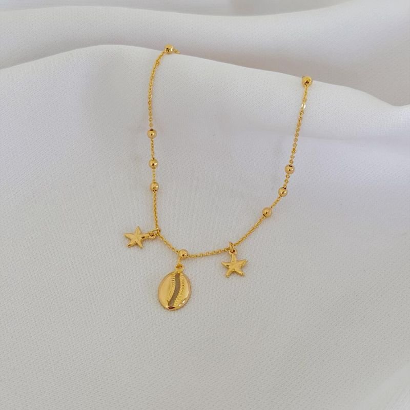 TORNOZELEIRA ESTRELAS DO MAR E BÚZIOS 23 CM + EXTENSOR EM OURO 18K