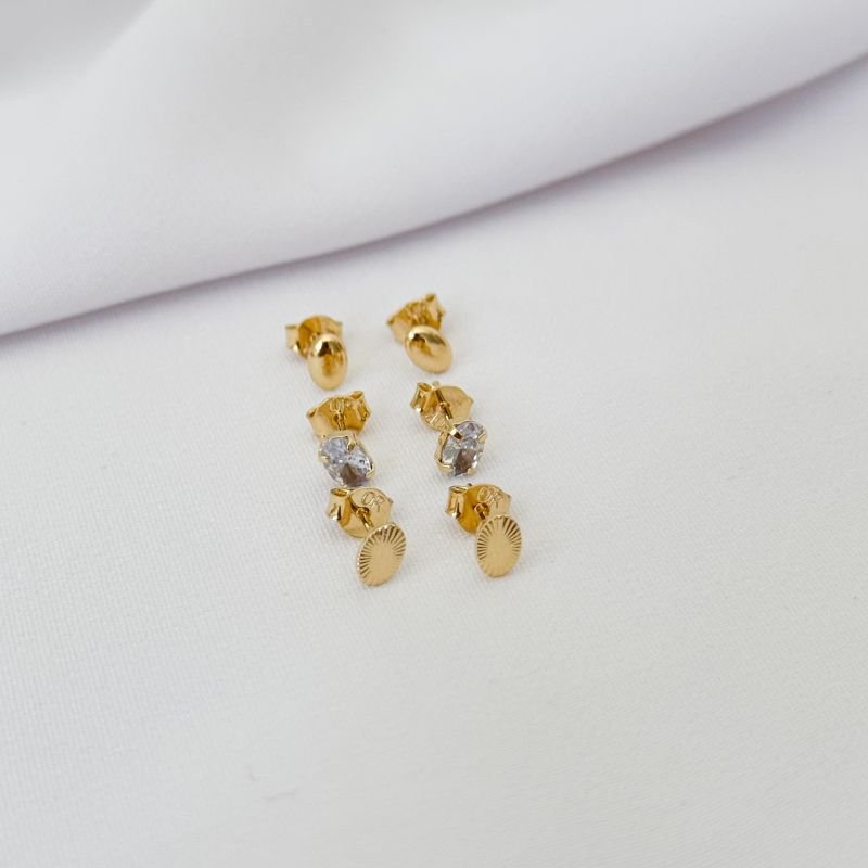 TRIO OVAL LISO, DIAMANTADA E PEDRA EM OURO 18K