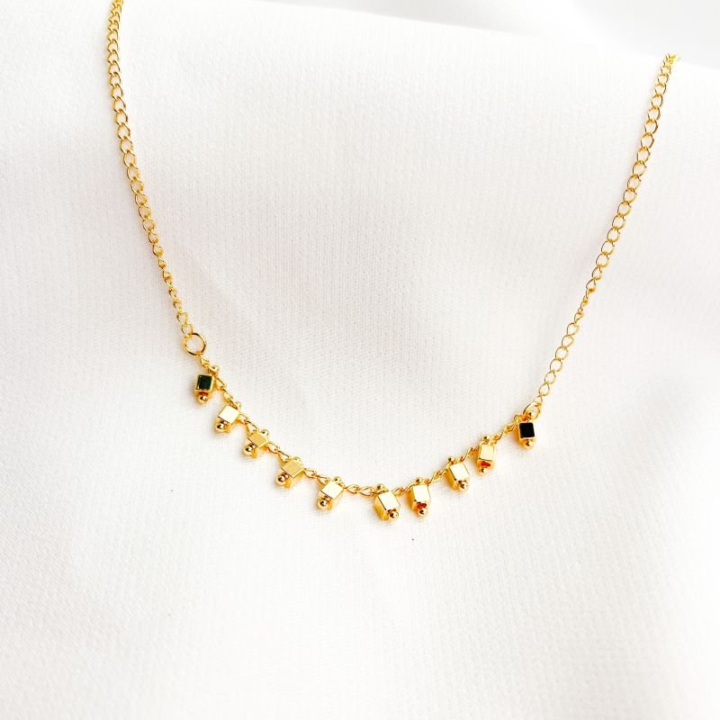 TORNOZELEIRA QUADRADINHOS ESCOVADOS EM OURO 18K